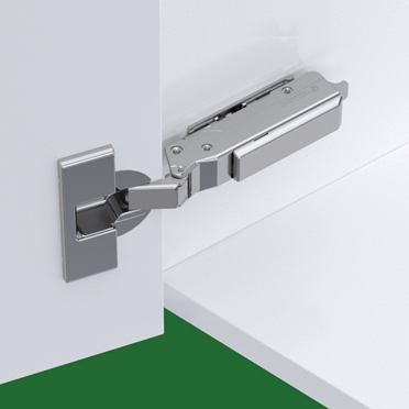 Grass Tiomos scharnier afgebeeld in een witte, geopende kast