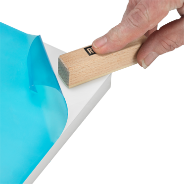 Dispozitiv pentru desprinderea foliei REDOCOL, pentru îndepărtarea de folie de protecție