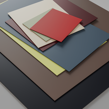 Gestapelte Linoleumplatten in verschiedenen Farben und Größen.