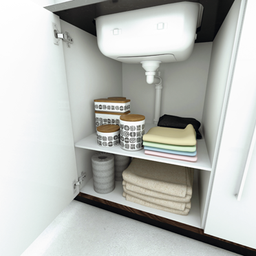 Le siphon Panama peu encombrant est monté sous l'évier. L'espace de rangement est optimisé grâce à des surfaces de rangement intégrées pour les articles ménagers.