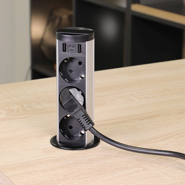 Table with furniture power socket by Complement