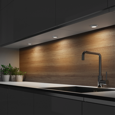 Sensio spotlights create targeted highlights in kitchen areas.