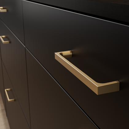 Ročaj zlate barve na črni sprednji strani