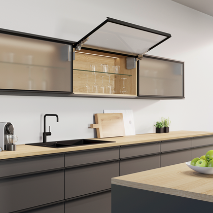 Kitchen with wall unit and open glass front.